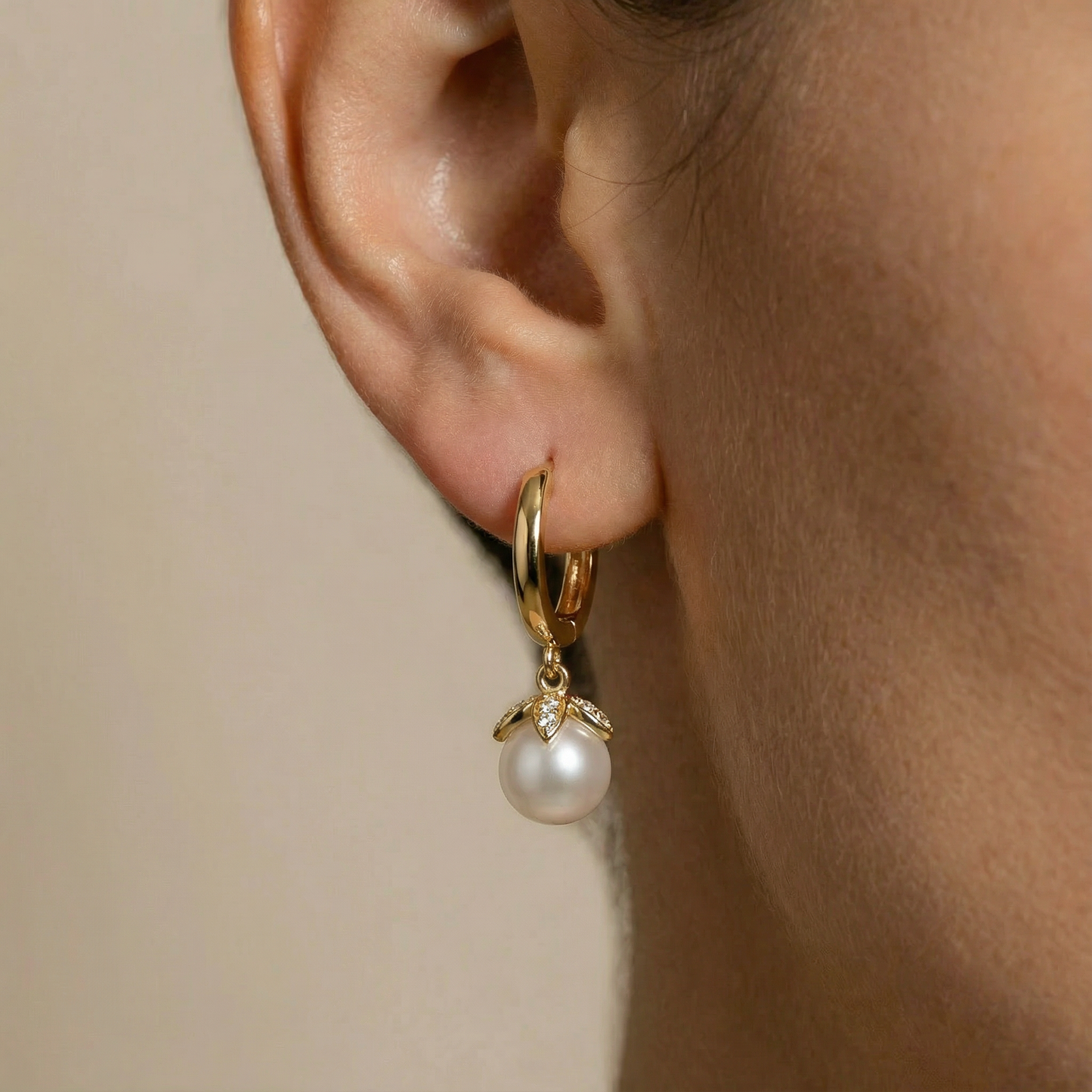 Maira 18ct and 22ct gold huggie hoop earrings with a Pearl Drop by Karat Goldsmiths 