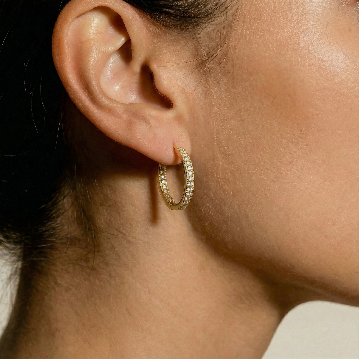 Duale 18ct yellow gold hoops by karat goldsmiths, set with CZ stones