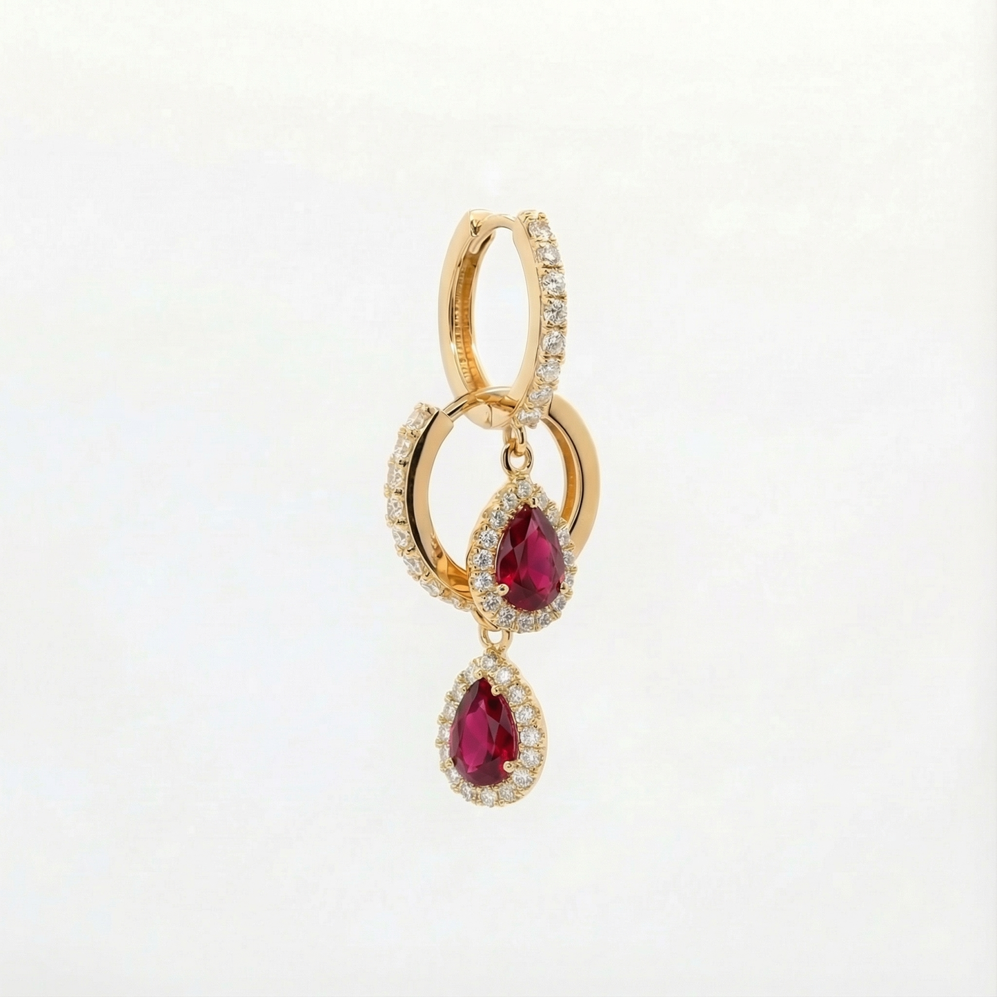 
                  
                    Elara 18ct and 22ct yellow Gold hoop earrings with a ruby stone-set pear drop, by Karat Goldsmiths
                  
                